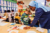 A religious Sister wearing a blue habit teaching a preschool class